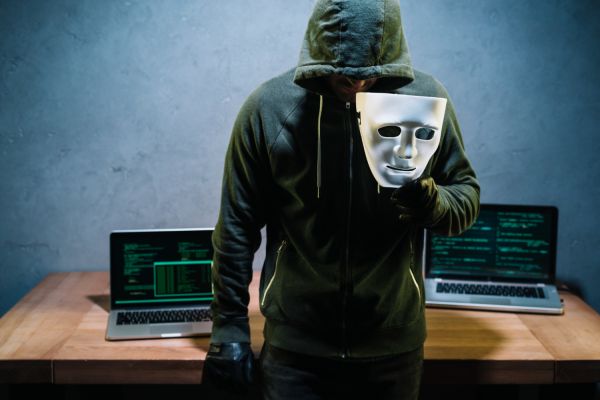 https://www.freepik.com/free-photo/hacker-holding-mask_3361128.htm#fromView=search&page=1&position=12&