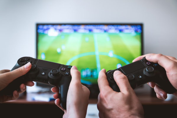 https://unsplash.com/photos/two-people-playing-sony-ps4-game-console-eCktzGjC-iU